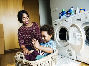 Mother and son doing housework together