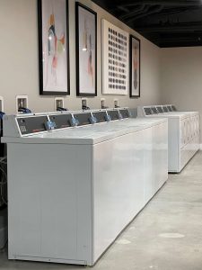 Rows of coin-operated washing machines